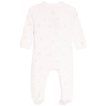 A long-sleeve baby footed sleeper in white with a delicate pink bow and heart pattern, shown flat against a white background.