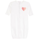 A white short-sleeve baby sleep sack with a pink textured heart applique on the chest, featuring a snap-button front closure and elasticized hem.
