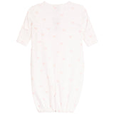 A baby long-sleeve sleep sack in white with a delicate pink bow and heartpattern, shown flat against a white background.