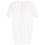 A white short-sleeve baby sleep sack with a subtle all-over light blue star pattern, featuring a front snap closure and elastic cuffs.