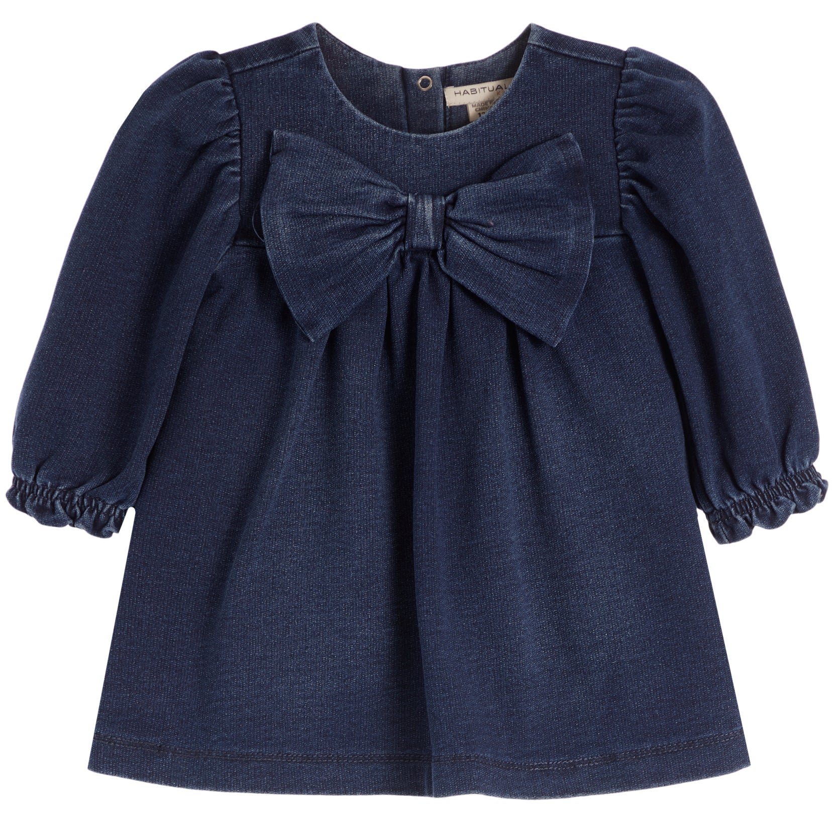 A toddler girl's navy blue denim long-sleeve top featuring a large matching fabric bow at the neckline and ruffled cuffs, shown against a plain white background.