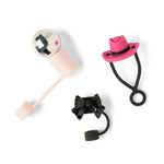 Three small Straw Toppers on a plain white background: a light pink with a disco ball top, a black bow, and a pink hat with a black band.