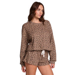long-sleeve cropped sweatshirt with leopard print shot against a solid white background.