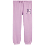 Purple jogger sweatpants with a bow and heart design on the leg against a white background