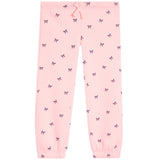 Pink jogger pants with an all-over small black bow print, featuring an elastic waistband with a matching drawstring and elastic ankle cuffs.
