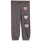 A pair of dark gray heather jogger pants featuring three textured, chenille lavender-pink hearts running down the right leg, with a matching gray heather drawstring waistband.