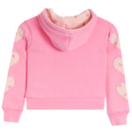 Pink cropped hoodie with heart-shaped appliques on the sleeves and a floral-patterned hood lining, shown against a plain white background.