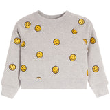A light gray heather crewneck sweatshirt with an all-over yellow smiley face pattern, shown flat against a white background.