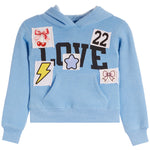 Light Blue hoodie with love written across and patches of a bow w cherries, bow. 22, lightning bolt and star.