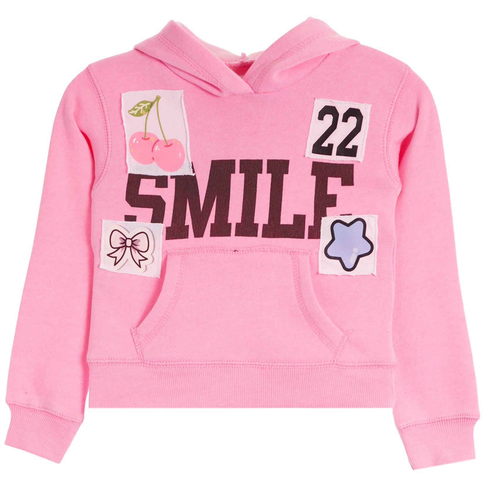 A pink long-sleeve hoodie with a front kangaroo pocket, featuring decorative patches and appliques including the word 'SMILE' in black, cherries, the number 22, a bow, and a star.