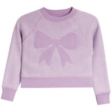 A light purple crewneck sweatshirt with a large bow applique on the front, displayed against a solid white background.