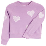 A lavender purple crewneck sweatshirt with white embroidered lace-heart details on the front and sleeves, displayed on a clean white background.