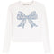 A white long-sleeve crop top featuring a large blue paisley-patterned bow graphic on the front, with the brand name 'girls do too' printed inside the collar.