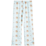 Light blue fleece pants with an all-over print of small beige and white dog illustrations and tiny pink bows, shown flat against a white background.