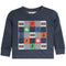 A navy blue long-sleeve baby/toddler shirt with a colorful graphic checkerboard design on the front featuring the word 'DUDE' and various icons like smiley faces, lightning bolts, and peace signs.
