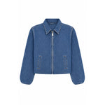 A cropped blue denim jacket with a full front zipper, pointed collar, and two vertical welt pockets on the front, shown against a plain white background.