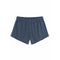 A pair of slate blue athletic shorts with an elastic waistband, shown flat against a solid white background.