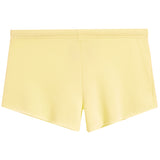 A pair of light yellow athletic shorts with an elastic waistband, shown flat against a plain white background.