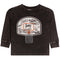 A toddler's long-sleeve t-shirt in a washed black or dark charcoal color, featuring a large graphic of a basketball hoop on the front with graffiti-style text.