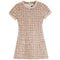 A short-sleeve tweed mini dress in a beige, brown, and blue houndstooth pattern, featuring a round neckline with pearl embellishments and a flared skirt, shown against a plain white background.