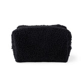 Black bouclé cosmetic pouch with a top zipper, shown on a clean white background.
