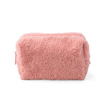 Pink fluffy  bouclé cosmetic pouch with a top zipper, shown on a clean white background.