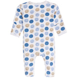 A white long-sleeve baby footless one-piece romper covered in a pattern of smiling face circles in shades of blue and beige, shown against a plain white background.