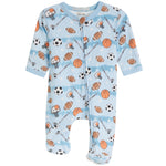 A baby long-sleeve footed sleeper in light blue with an all-over sports print of basketballs, footballs, soccer balls, hockey sticks, and goals, shown on a plain white background.