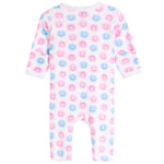 A baby long-sleeve footless one-piece romper with an all-over pink and blue smiley face pattern on a white background.