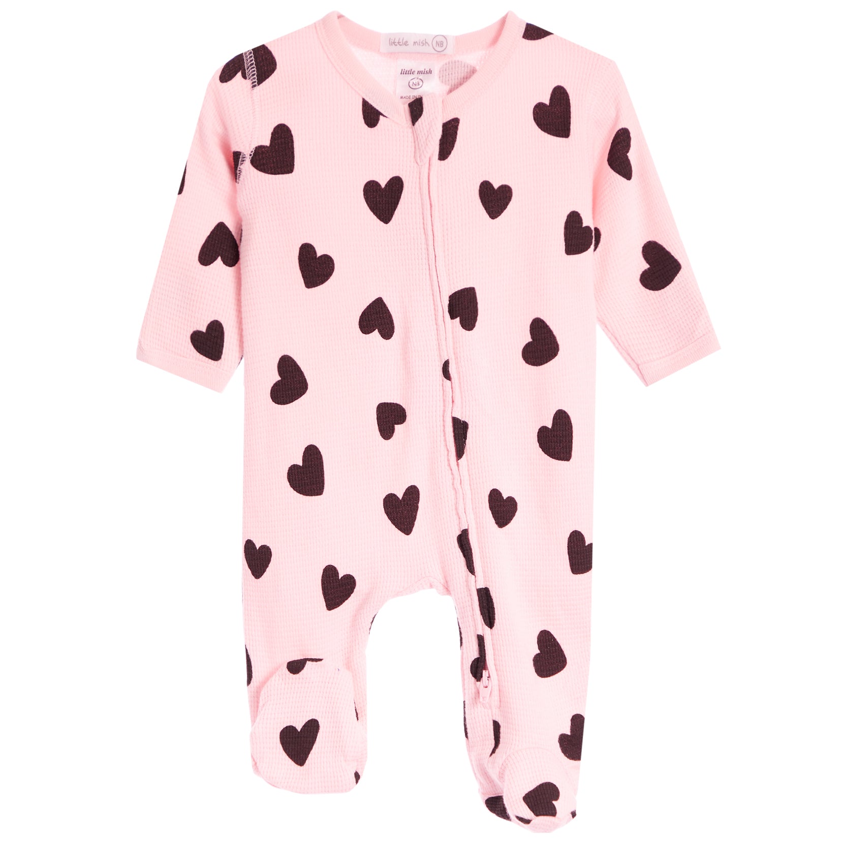 A pink footed sleeper with an all-over black heart pattern, featuring a front zipper and long sleeves and legs, shown on a plain white background.