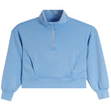 A light blue cropped quarter-zip sweatshirt with a mock neck, elastic cuffs, and side seam details, shown on a plain white background.
