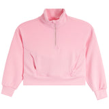 A light pink cropped long-sleeve quarter-zip sweatshirt with a mock neck collar, displayed on a clean white background.