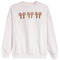 A light heather gray crewneck sweatshirt featuring three brown ribbon-bow motifs across the chest, displayed on a clean white background.