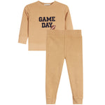 A two-piece kids' sweatshirt and jogger pants set in a warm tan color. The sweatshirt features the text 'GAME DAY' in navy blue with a small football graphic, and the pants have a wide elastic waistband and cuffs.
