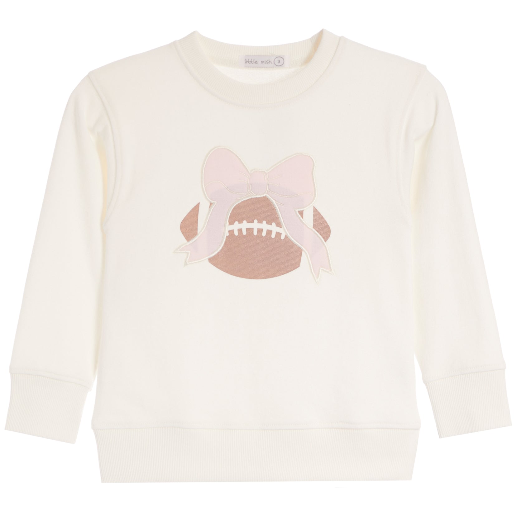 An off-white long-sleeve crewneck sweatshirt featuring a graphic of a brown football with white laces and a light pink bow on the front.