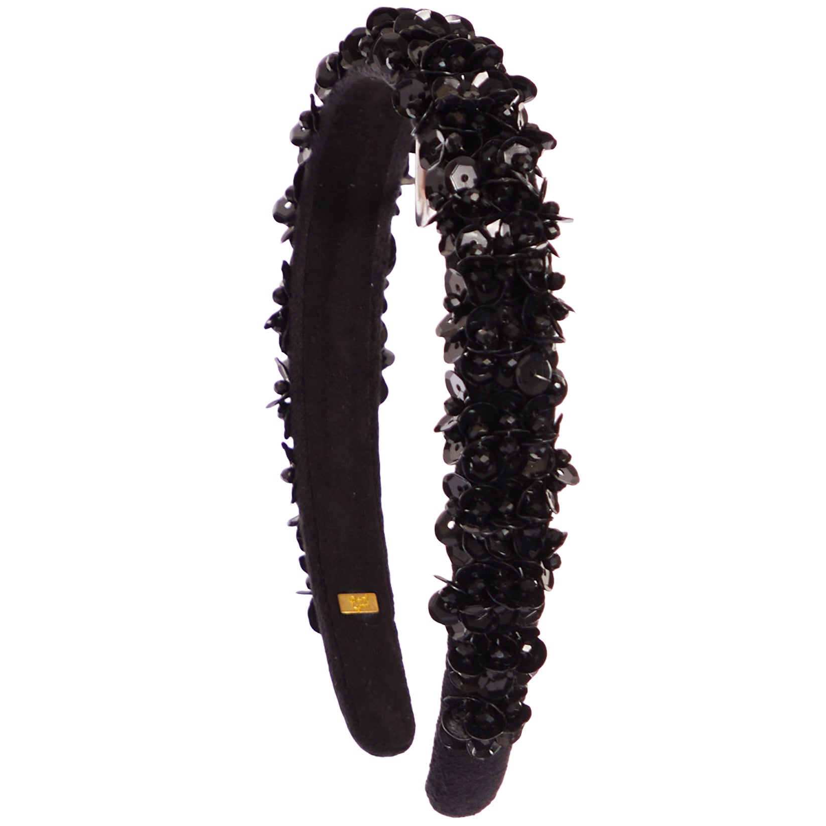 A black velvet headband embellished with black sequins and faux flowers, shown against a plain white background.