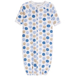 A baby sleep sack with short sleeves and a front snap closure, featuring an all-over pattern of blue and tan smiley faces on a white background.