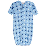 A baby long-sleeve footless sleeper in light blue with an all-over star print in navy and white, featuring a snap-button front closure.
