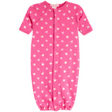 A pink short-sleeve baby Converter with an allover pattern of small white and light pink hearts, featuring a snap-button front closure and elastic bottom.