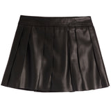 A black faux-leather pleated mini skirt with a wide waistband, shown flat against a solid white background.