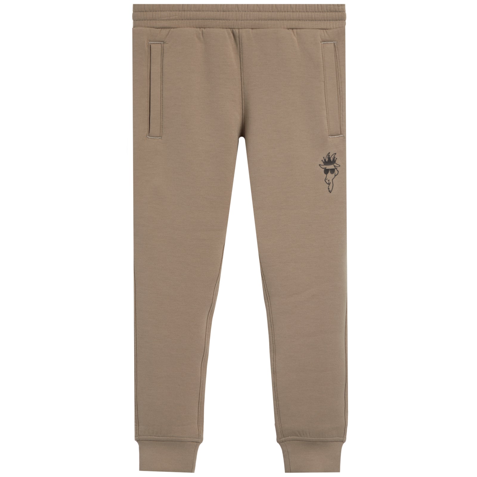 A pair of beige jogger sweatpants with a small black graphic of a face wearing sunglasses on the left thigh, shown against a plain white background.