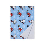 A folded light blue blanket or throw featuring a repeating pattern of cartoon Santa Claus goat and Snowman goat with white snowflakes, shown on a plain white background.