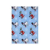 A light blue blanket or throw featuring a repeating pattern of cartoon Santa Claus goat and Snowman goat with white snowflakes, shown on a plain white background.