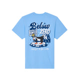 A light blue short-sleeve t-shirt with a graphic print on the front featuring goat penguin and mountains