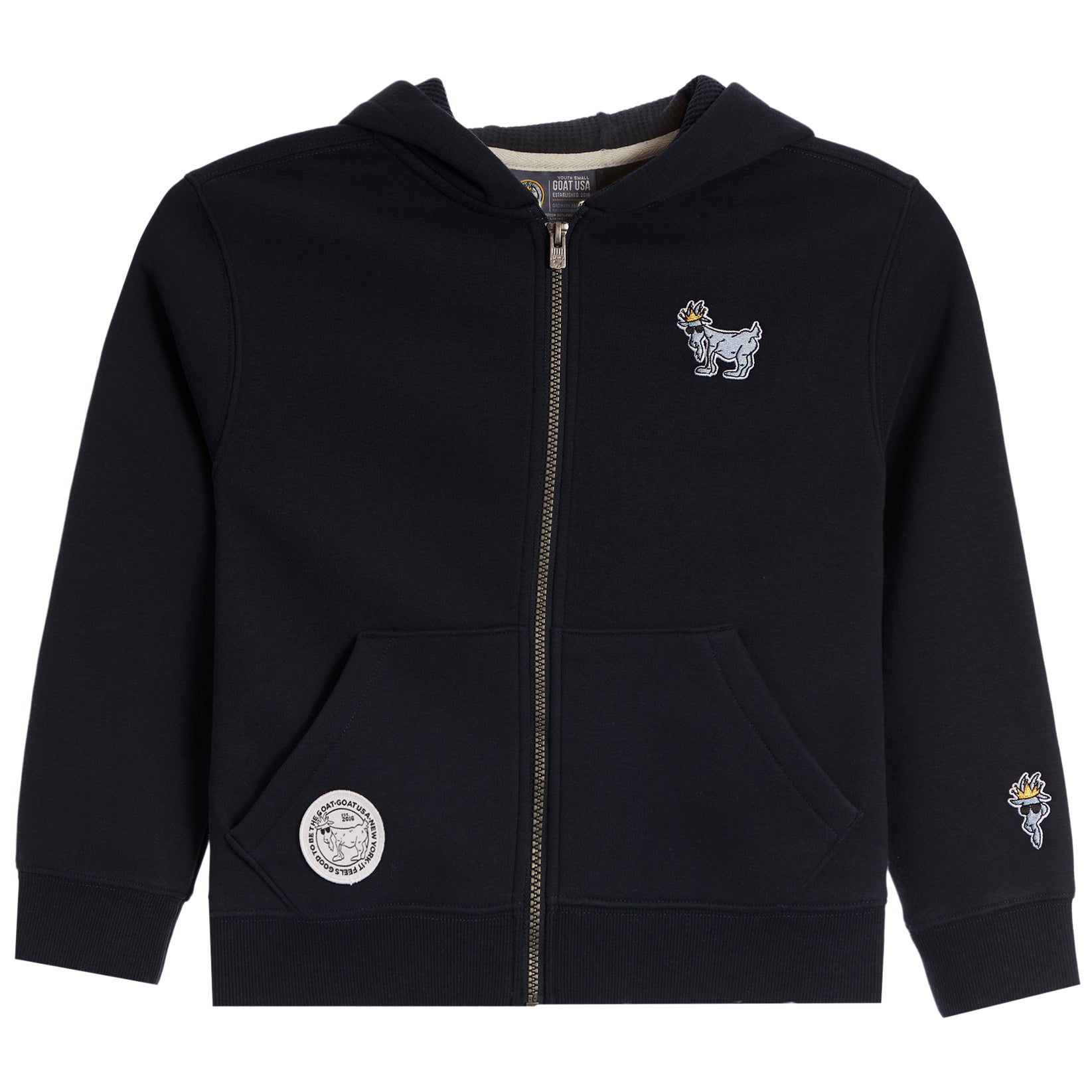 A black zip-up hoodie sweatshirt for kids, featuring a small embroidered goat mascot on the left chest, a circular patch on the right pocket, and a small embroidered patch on the right sleeve, shown against a plain white background.