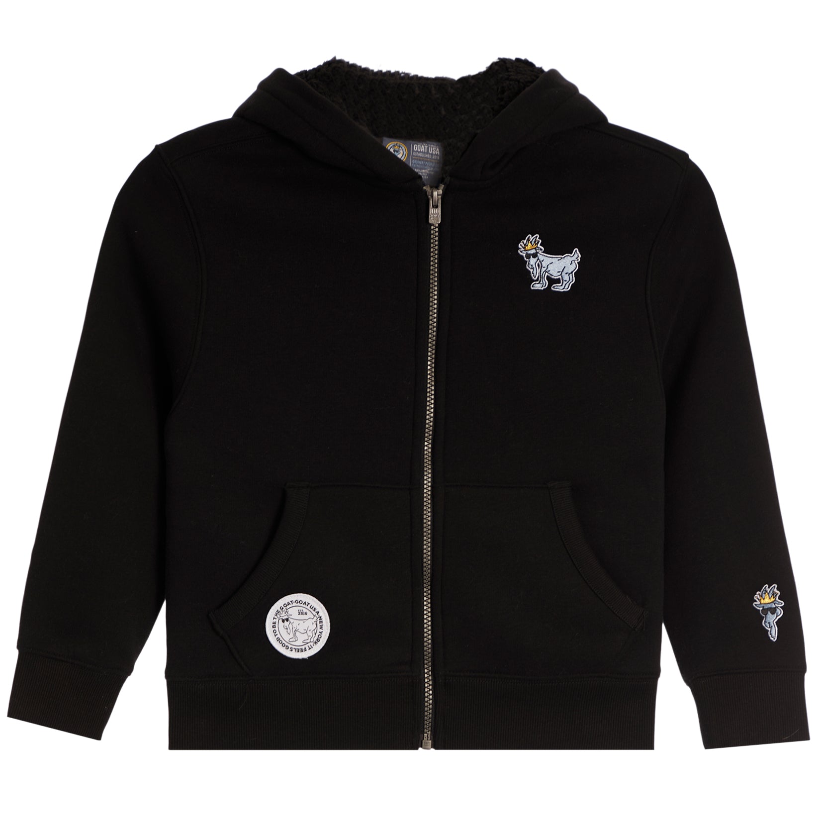 A black zip-up hoodie for kids, featuring a sherpa-lined hood, front pockets, a small dog patch on the left chest, a circular patch on the right pocket, and a small patch on the right sleeve.