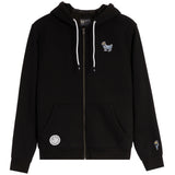 A black zip-up hoodie with white drawstrings, featuring a small embroidered dog graphic on the left chest, a circular patch on the lower left front pocket, and a small graphic on the right sleeve, shown against a plain white background.