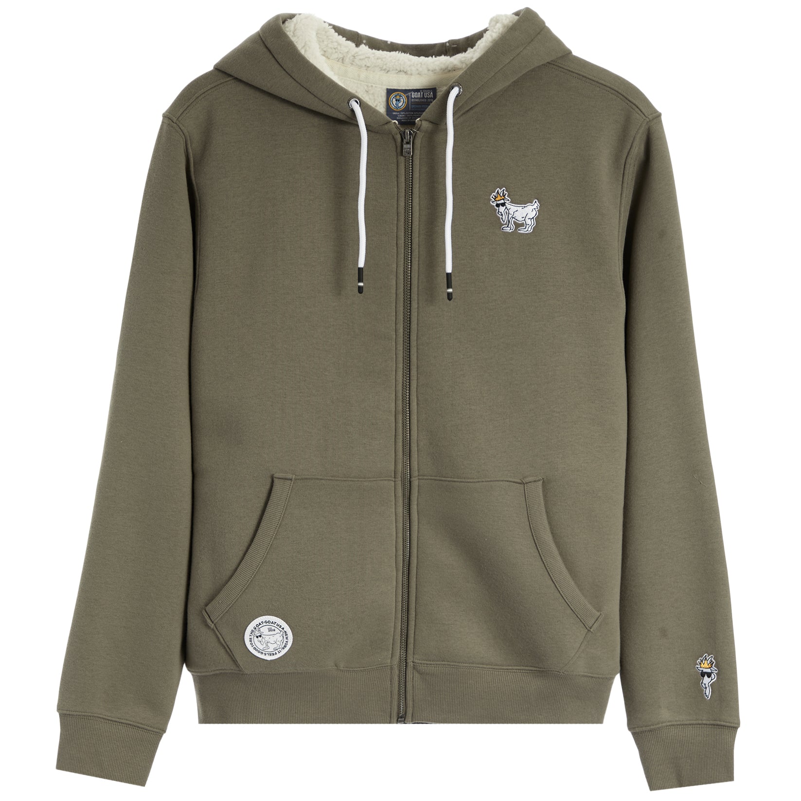 An olive green zip-up hoodie with a white sherpa lining inside the hood, featuring white drawstrings, a front kangaroo pocket, and small embroidered mascot logos on the left chest and right sleeve.