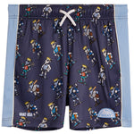 A pair of kids' athletic shorts featuring a navy blue base with an all-over print of cartoon soccer players wearing gold crowns. The shorts have light blue side panels with white piping, a white drawstring, and 'GOAT USA' branding on the lower left leg.
