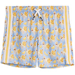 Light blue swim trunks featuring an all-over print of cartoon goats wearing sunglasses next to yellow bananas, with yellow and white side stripes and a white drawstring.